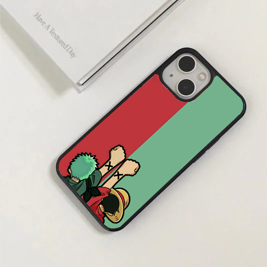 Minimalist split red and green phone case showing Luffy and Zoro from behind, raising their left arms to reveal the black X mark.